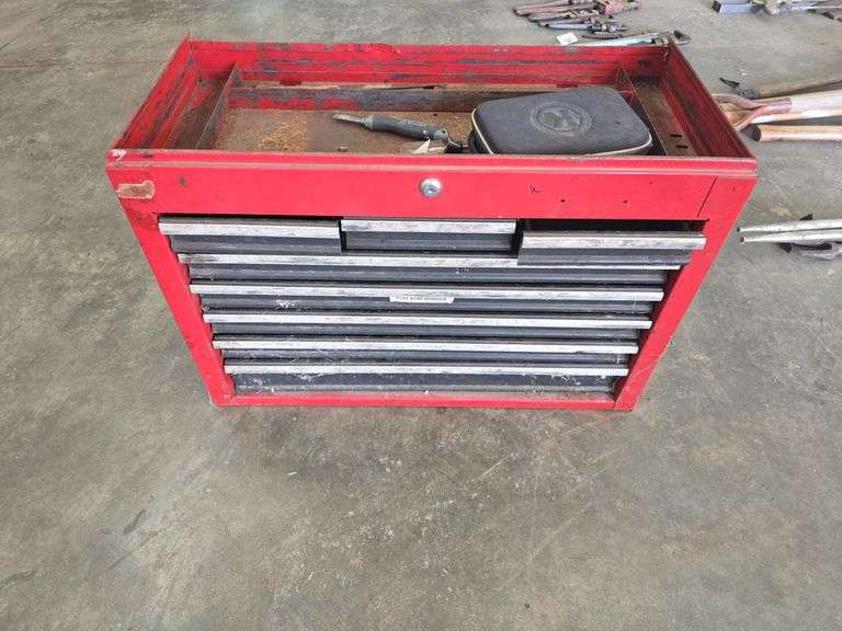 Toolbox with several misc. tools, including flat screwdrivers, nut drivers, and Phillips Screwdrivers.