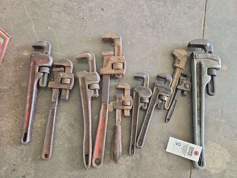 Assortment of pipe wrenches.