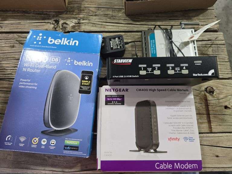 Wireless router, cable modem, 4 port USB port - Schmid Auction