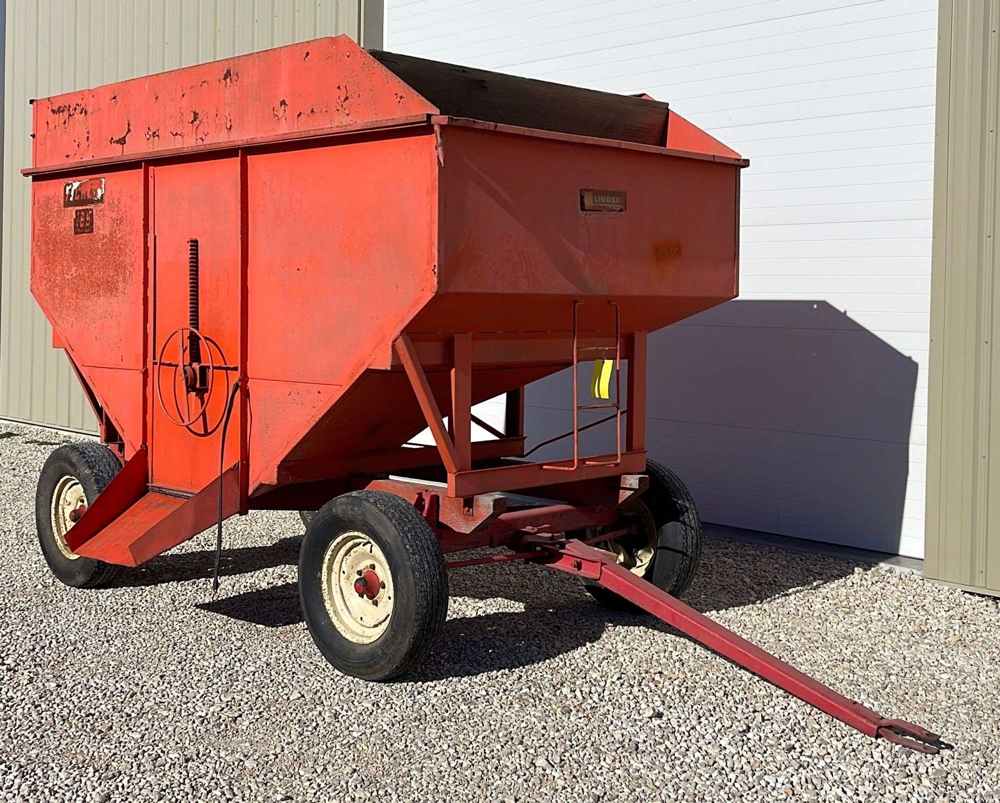 Ficklin 185 bushel gravity box on wagon gear - Schneider