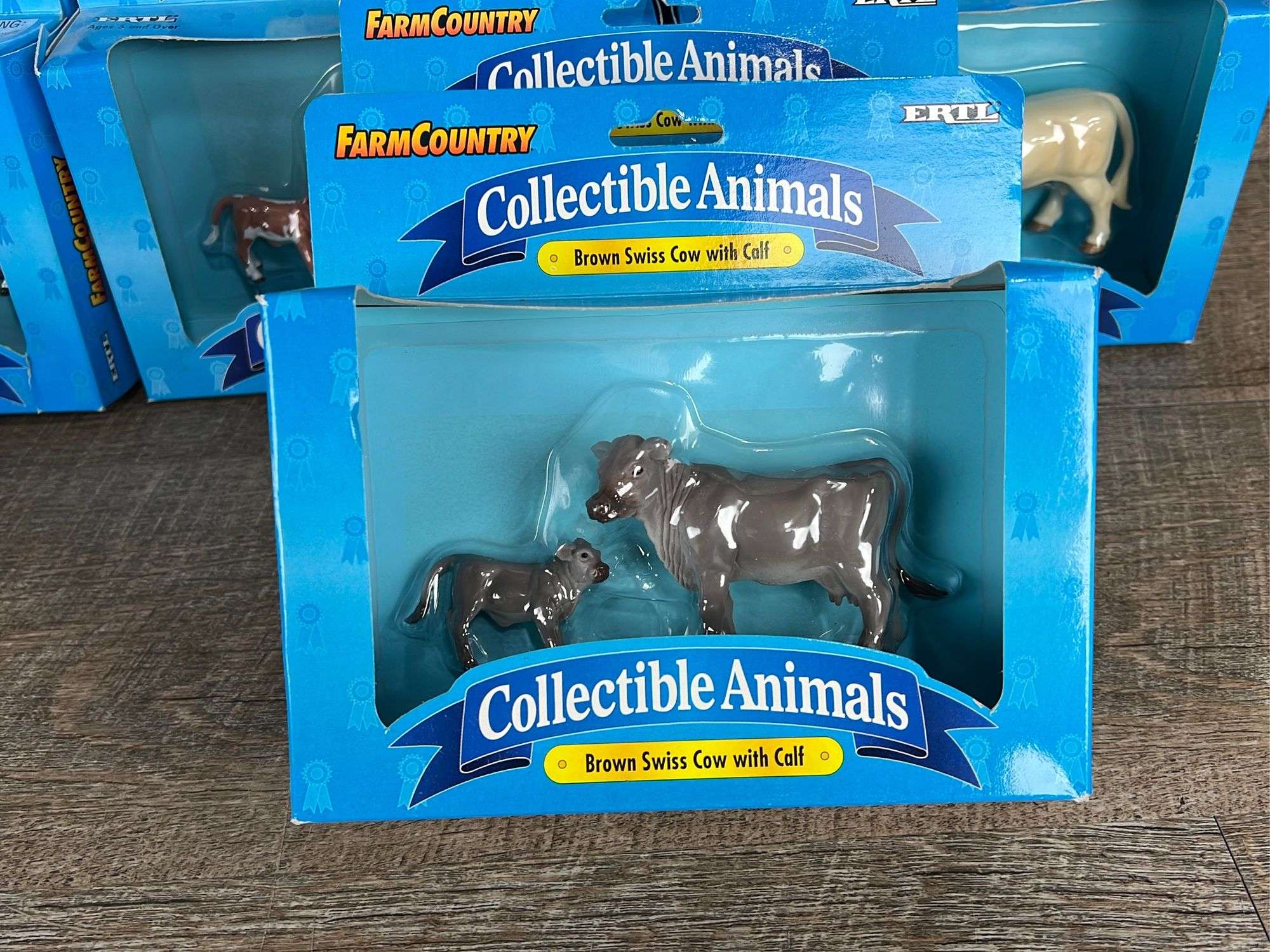 Group of Ertl Farm Country farm animals - Schneider Auctioneers LLC