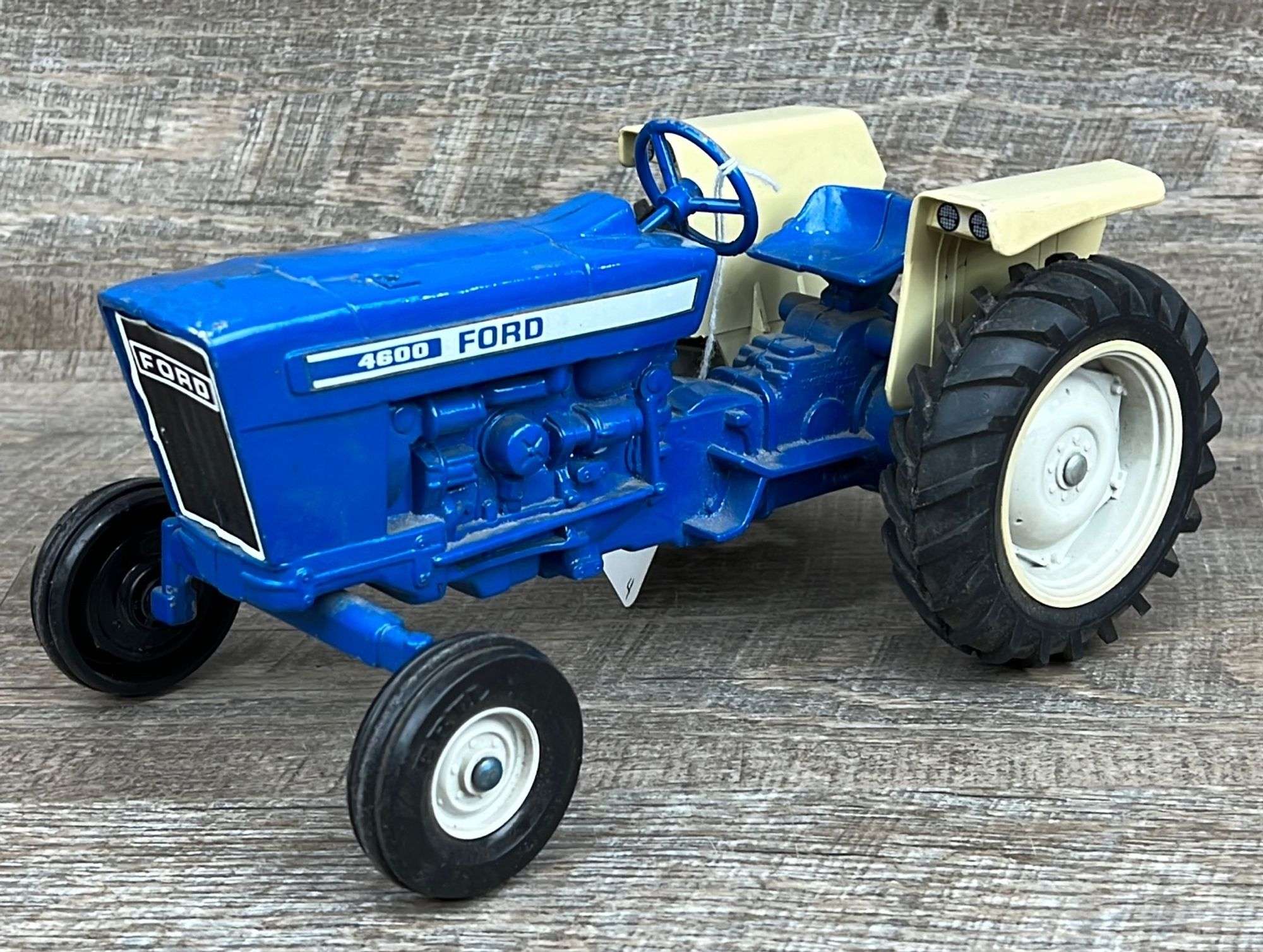 1/12 Ertl Ford 4600 tractor - Schneider Auctioneers LLC
