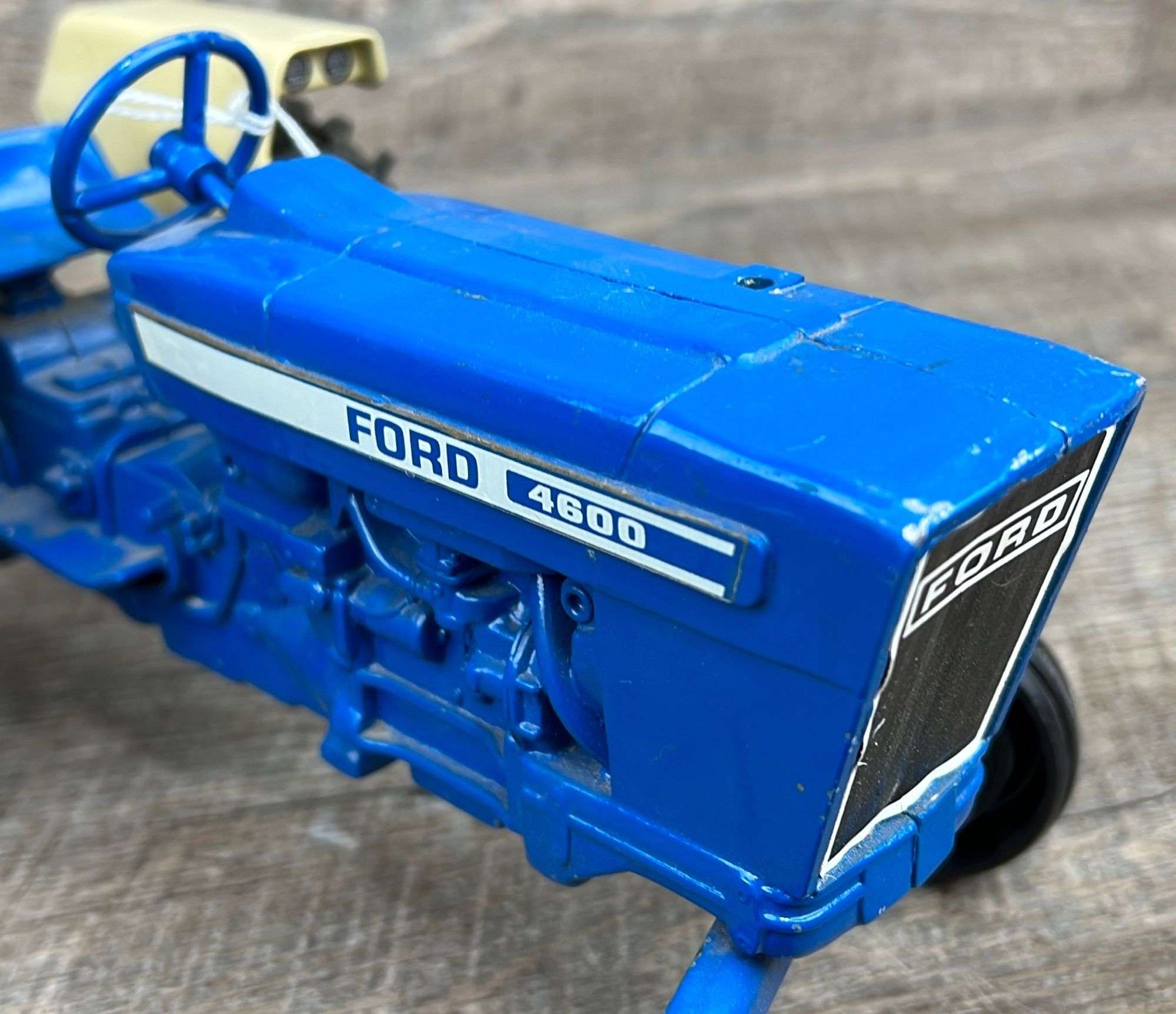 1/12 Ertl Ford 4600 tractor - Schneider Auctioneers LLC