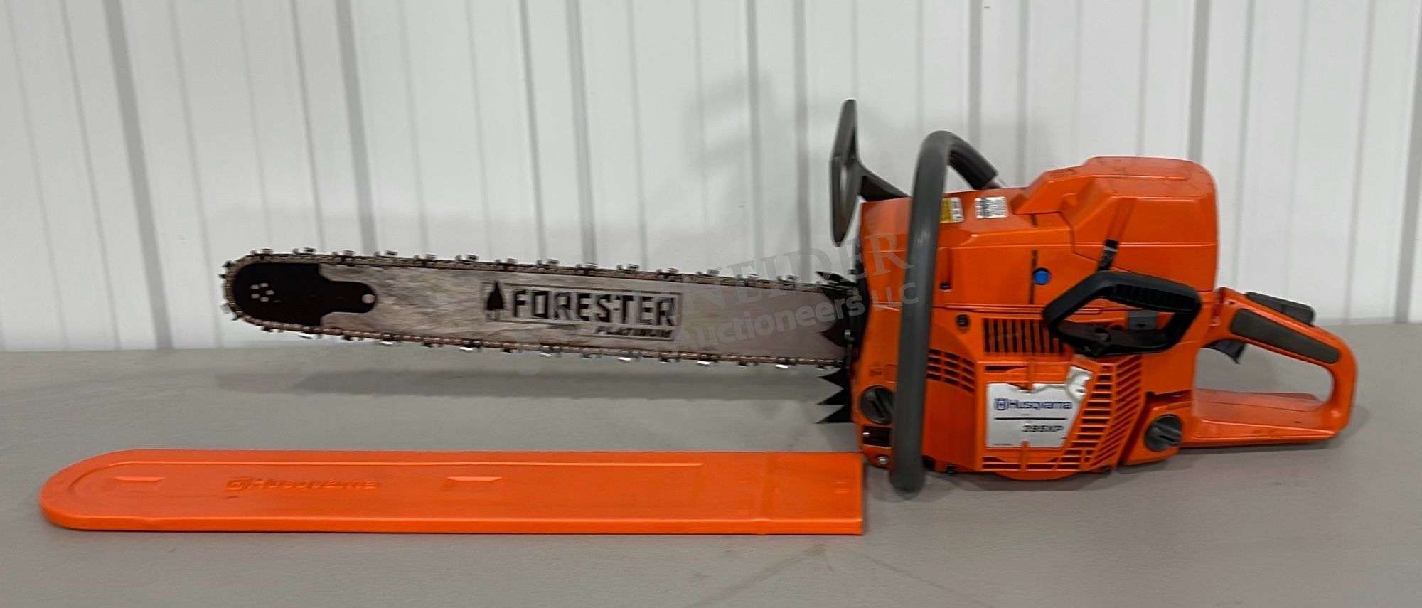 Husqvarna 395xp chainsaw - Schneider Auctioneers LLC