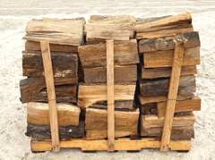 Group of seasoned oak firewood up to 16" long
