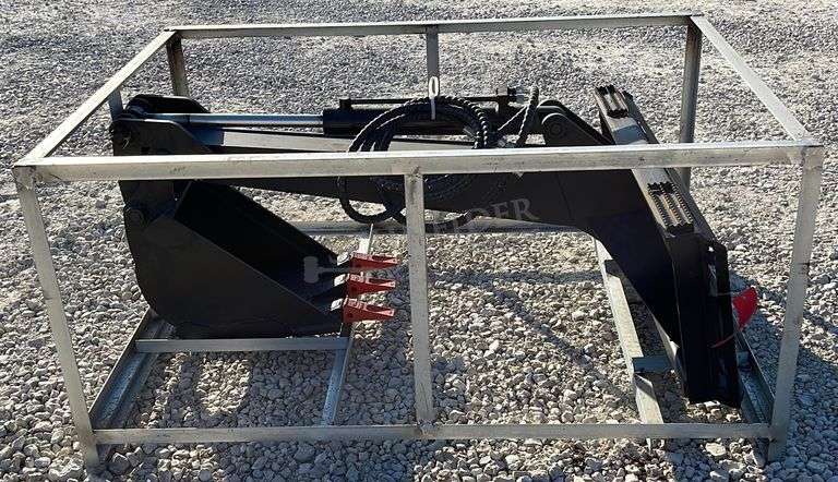 Unused skid steer fixed arm backhoe w/ 14" bucket