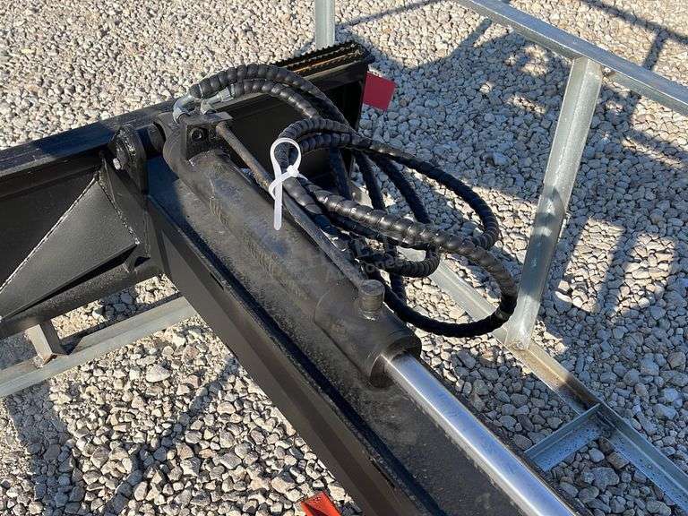 Unused skid steer fixed arm backhoe w/ 14" bucket