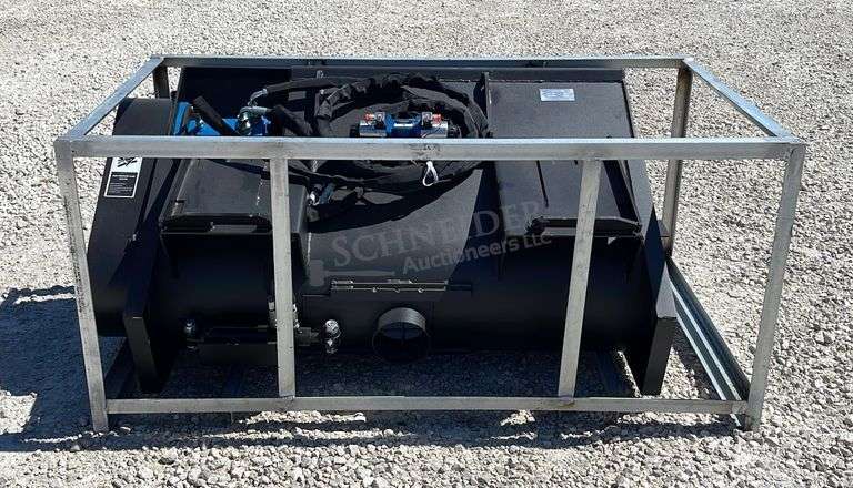 Unused skid steer mixing bucket