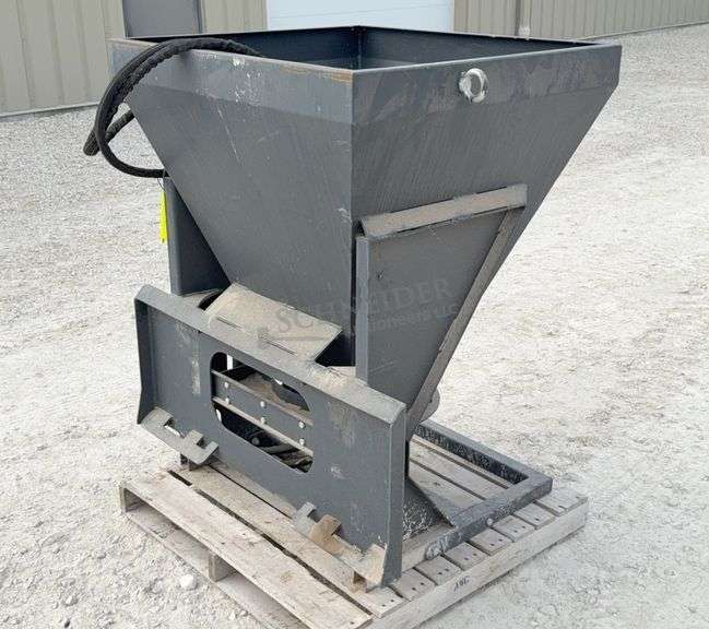 Wolverine skid steer seed spreader
