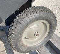 Rugid dumping lawn trailer