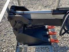 Unused skid steer fixed arm backhoe w/ 14" bucket