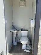 Unused portable double toilet unit