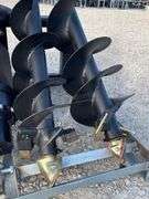 Unused skid steer auger w/ 3 augers