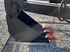 Unused skid steer fixed arm backhoe w/ 14" bucket