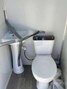 Unused portable double toilet unit