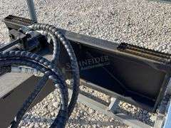 Unused skid steer fixed arm backhoe w/ 14" bucket