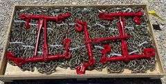 10 unused 5/16" 20' chains & 5 unused ratchet binders