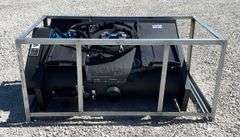 Unused skid steer mixing bucket