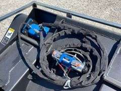 Unused skid steer mixing bucket