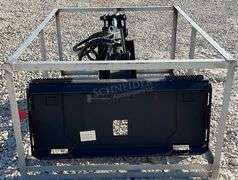 Unused skid steer fixed arm backhoe w/ 14" bucket