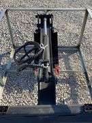 Unused skid steer fixed arm backhoe w/ 14" bucket