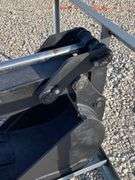 Unused skid steer fixed arm backhoe w/ 14" bucket