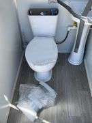 Unused portable double toilet unit