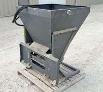 Wolverine skid steer seed spreader