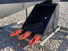 Unused skid steer fixed arm backhoe w/ 14" bucket