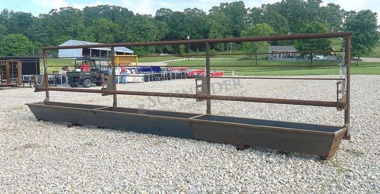 Unused 24' freestanding corral panel w/ bunk feeder