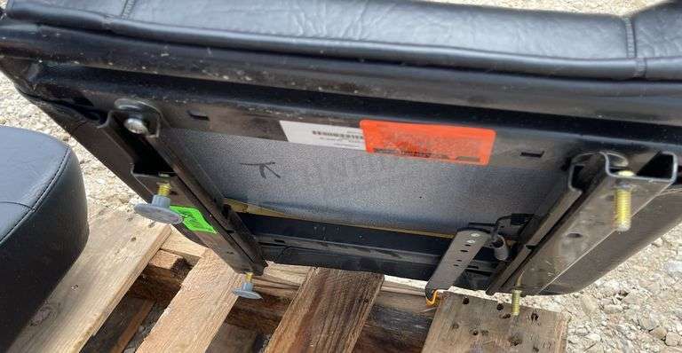 2-unused equipment seats & a Kubota rim