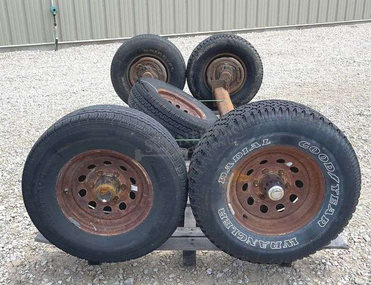 2- 6 lug rubber torsion axles w/ wheels & tires