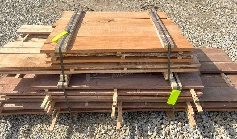 Group of walnut, cherry & oak rough cut lumber