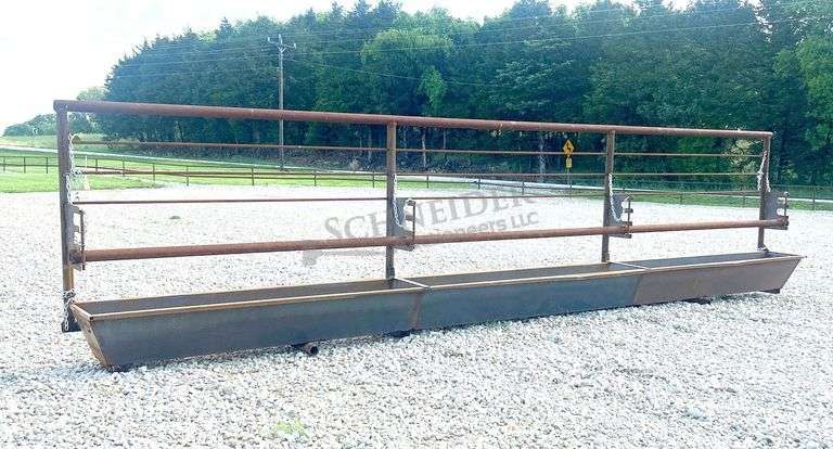 Unused 24' freestanding corral panel w/ bunk feeder