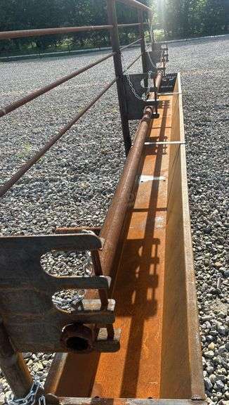 Unused 24' freestanding corral panel w/ bunk feeder