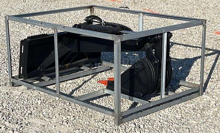 Unused skid steer fixed arm backhoe w/ 14" bucket