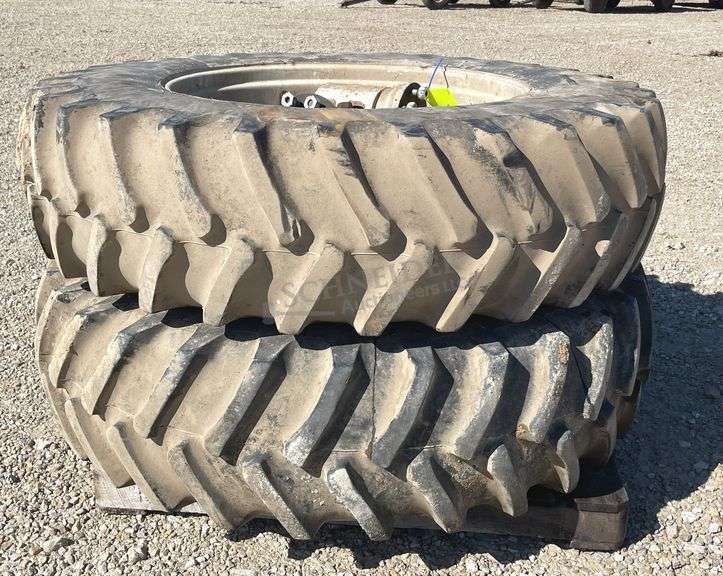 Pair of Firestone 18.4-38 tractor tires on rims w/ hubs