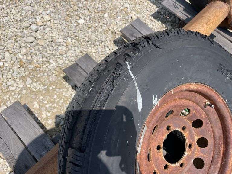 2- 6 lug rubber torsion axles w/ wheels & tires