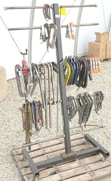 Group of clamps w/ rolling storage rack