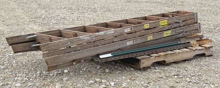22 steel t-posts and 2-wooden step ladders