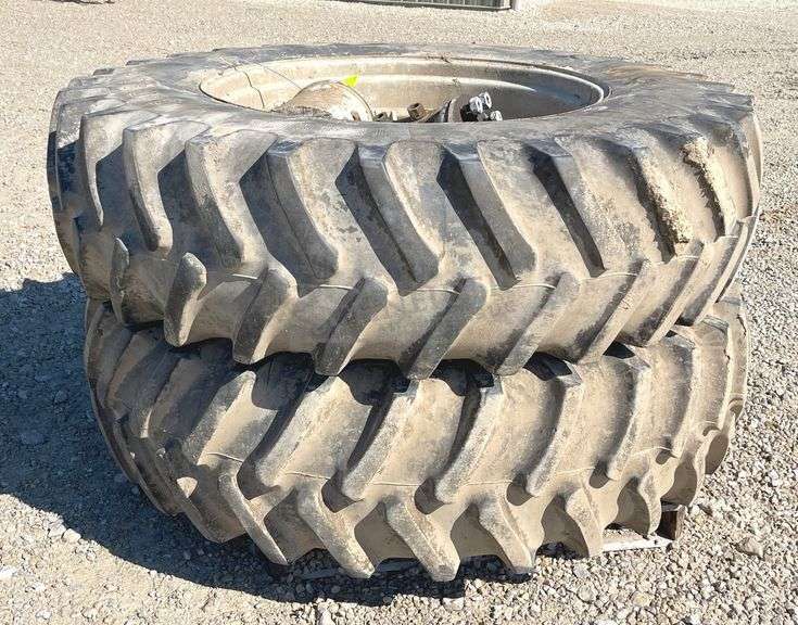 Pair of Firestone 18.4-38 tractor tires on rims w/ hubs