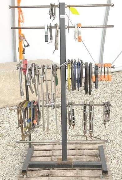 Group of clamps w/ rolling storage rack