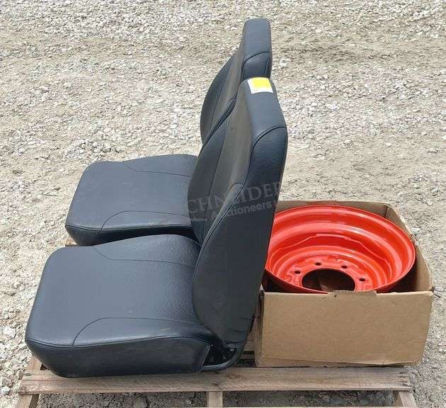 2-unused equipment seats & a Kubota rim