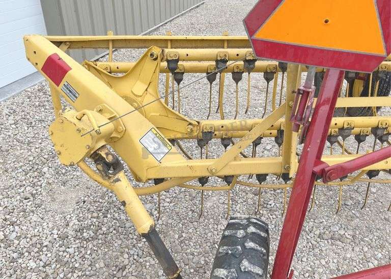 New Holland 258 side delivery hay rake w/ dolly wheels