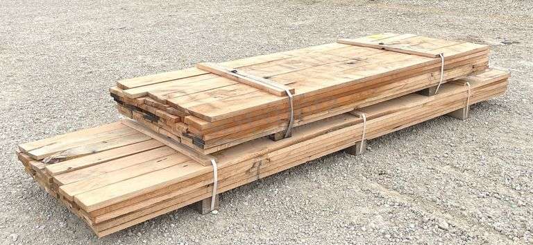 Group of rough sawn 1" thick red oak lumber up to 12.5' long
