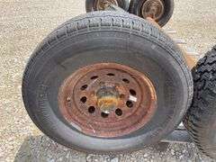 2- 6 lug rubber torsion axles w/ wheels & tires