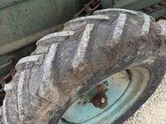 Ground drive manure spreader w/ steel floor