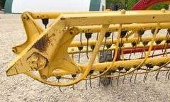 New Holland 258 side delivery hay rake w/ dolly wheels