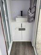 Unused 7.5'x20’ portable cabin w/ restroom