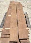 Group of 1" thick rough sawn walnut lumber